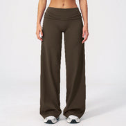 Brown wide-leg pants worn by a person on a white background