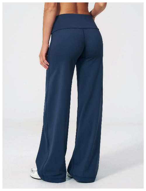 Navy blue wide-leg pants worn by a person on a white background