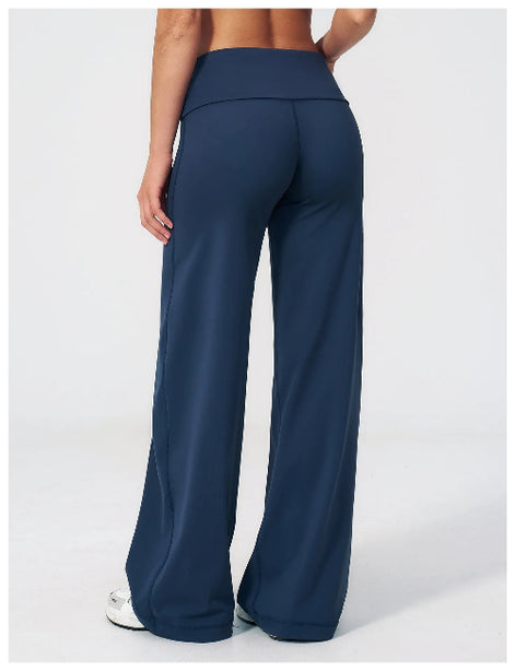 Navy blue wide-leg pants worn by a person on a white background