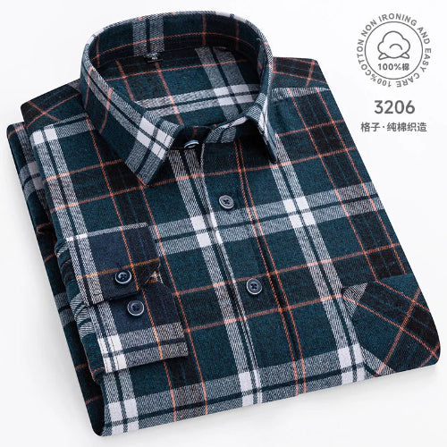 Folded plaid shirt with label on a white background