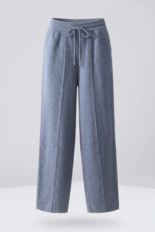 A pair of relaxed-fit, wide-leg trousers in a heathered slate blue-gray fabric, 
