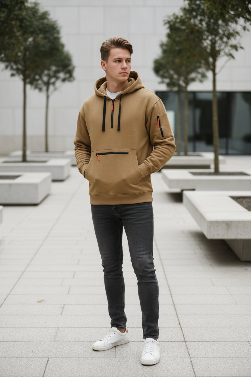 Beige hoodie with black and orange accents on a white background