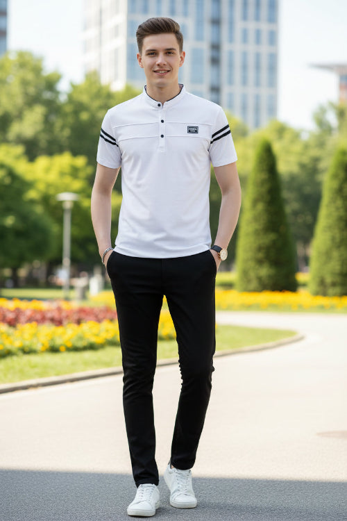 White short-sleeve shirt with black accents on a dark background
