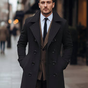 Man wearing a dark coat and brown vest on a city street