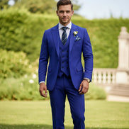 Blue suit with a tie and pocket square on a white background