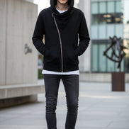 Black hoodie with a zipper on a white background