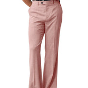 Pink pants worn by a person on a white background