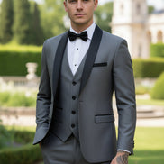 Gray tuxedo with black lapels and bow tie on a gray background