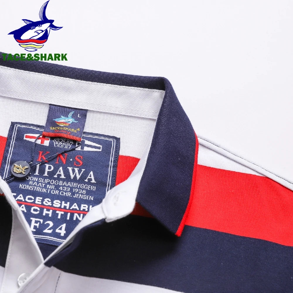 Close-up of a striped polo shirt collar and inner neck label, featuring navy blue, white, and red horizontal stripes. The brand label reads 'KNS IPAWA' and 'FACE & SHARK YACHTING'.