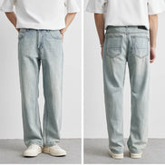 Light blue jeans shown from front and back on a person against a white background