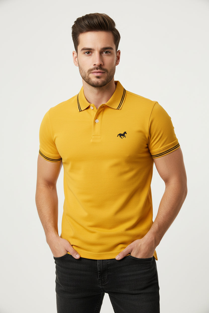 Yellow polo shirt with black accents worn by a person, featuring a horse logo.