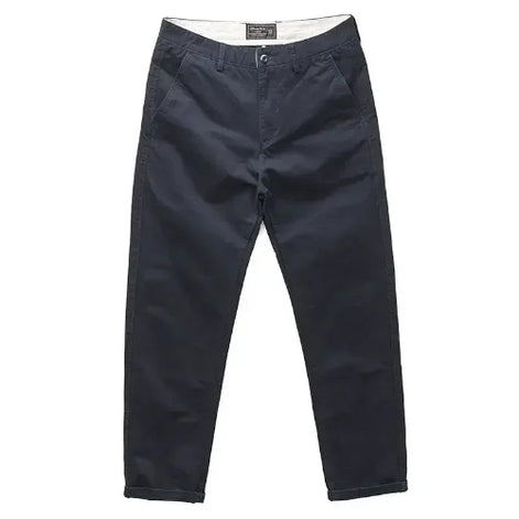 A pair of dark navy blue chino pants shown flat against a solid white background.