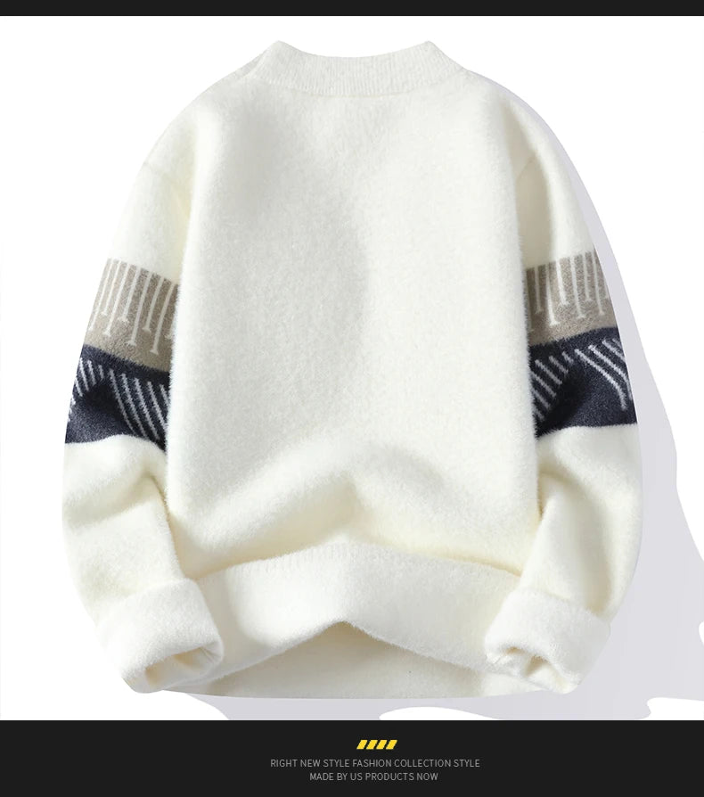 White sweater with black and gray patterned sleeves on a white background