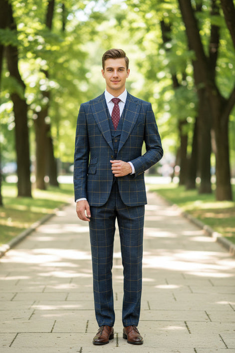 Blue checkered suit with red tie on a mannequin against a brown curtain background