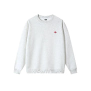 White sweatshirt with a small red logo on a white background