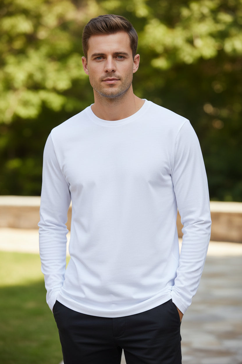 Man wearing a white long-sleeve shirt on a white background