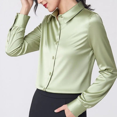 Light green silk shirt worn by a model, shown from the front.