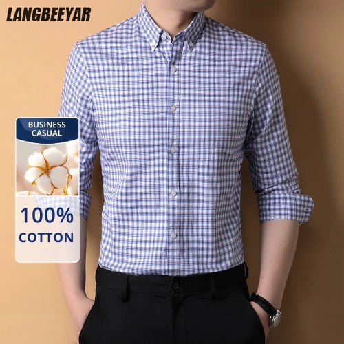 Man wearing a blue and white checkered shirt with a label indicating 100% cotton and business casual attire.