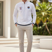 White long-sleeve shirt with brand logos on a white background
