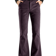 A person wearing dark purple flared pants with a black belt, paired with a black top and black shoes, shown against a plain white background.
