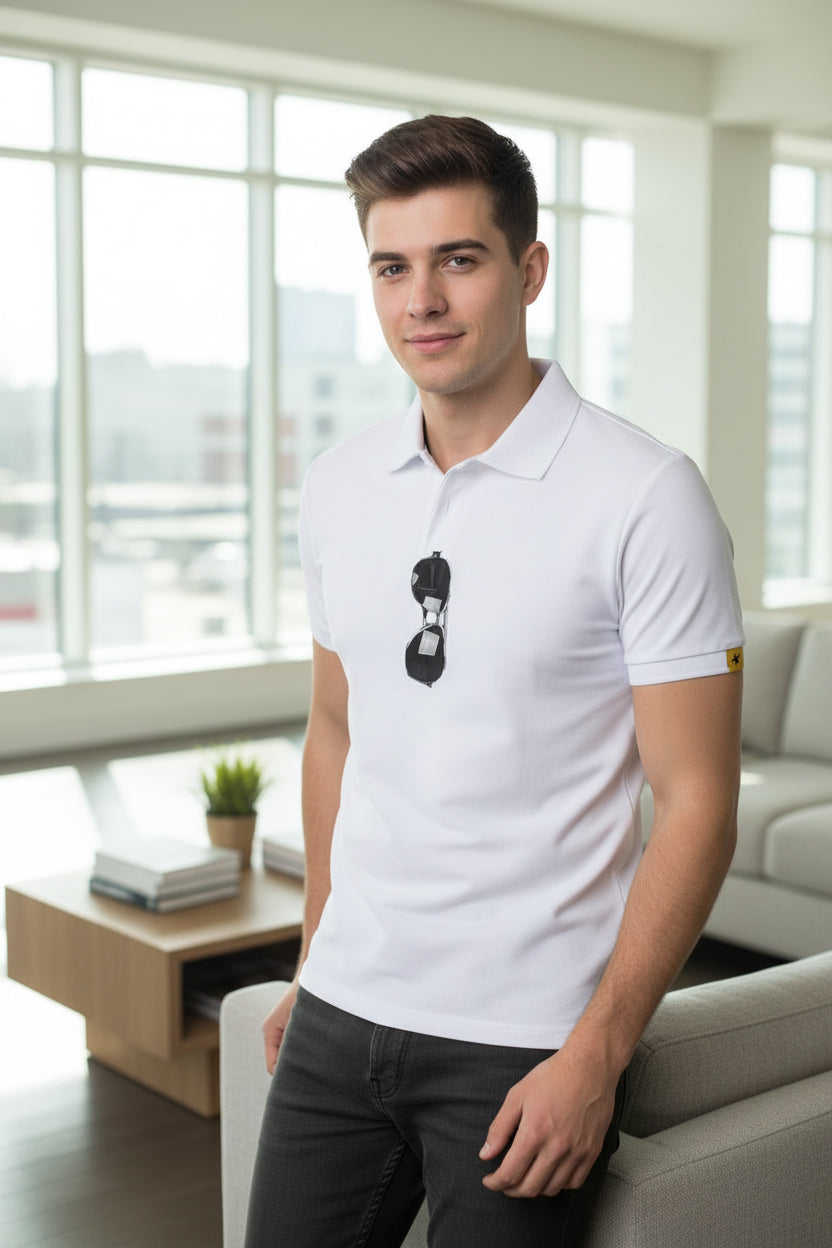 White polo shirt with sunglasses in the pocket on a white background
