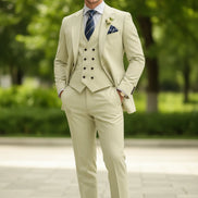 Light beige suit with a striped tie and pocket square on a white background