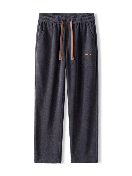 Dark gray sweatpants with a brown drawstring on a white background