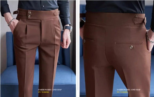 Brown pants displayed from front and back on a blue couch.