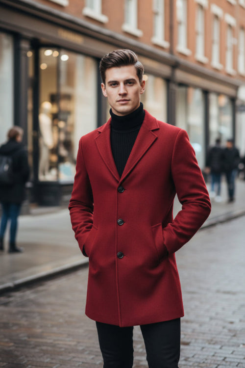 Red coat on a mannequin against a gray background