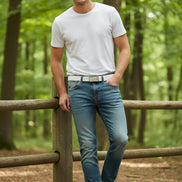 High end washed cropped pants for men with a white belt on a white background