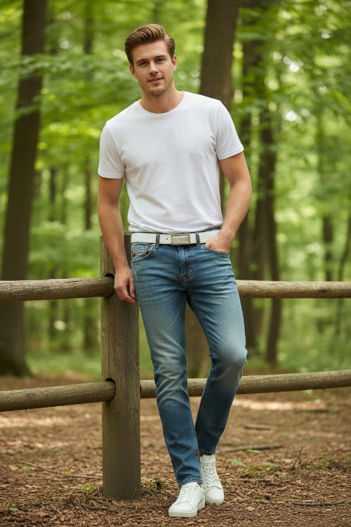 High end washed cropped pants for men with a white belt on a white background