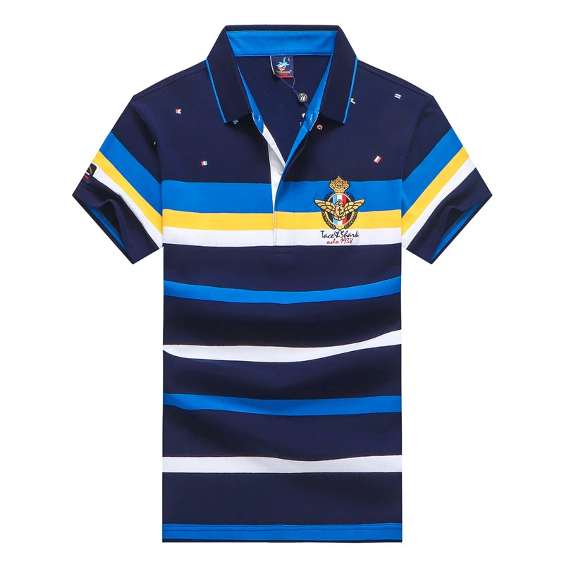 A short-sleeve polo shirt with horizontal navy, blue, yellow, and white stripes, featuring a gold and white military-style crest on the left chest.