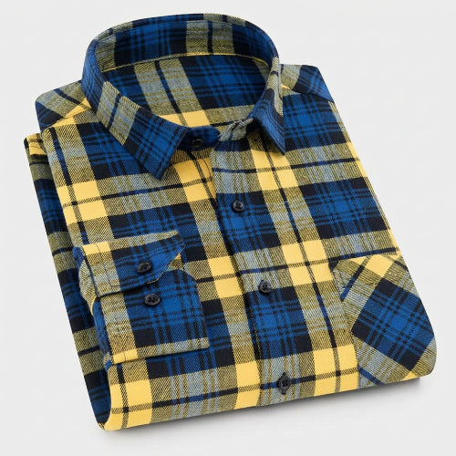 Folded blue and yellow plaid shirt on a white background