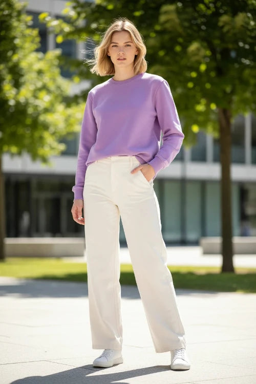 A lavender purple crewneck sweatshirt with long sleeves and ribbed cuffs and hem, 