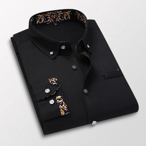 Black dress shirt with decorative cuffs and collar on a light gray background