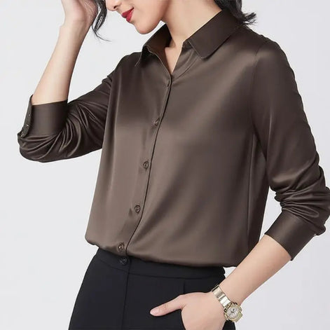 Dark brown silk shirt worn by a model, shown from the front.