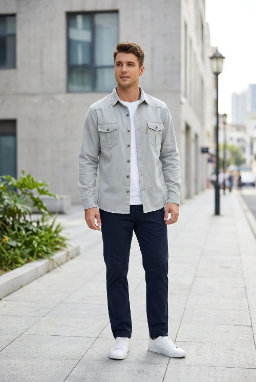 Light gray button-up shirt with two front pockets on a white background