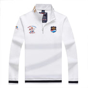 White long-sleeve shirt with logos and text on a white background