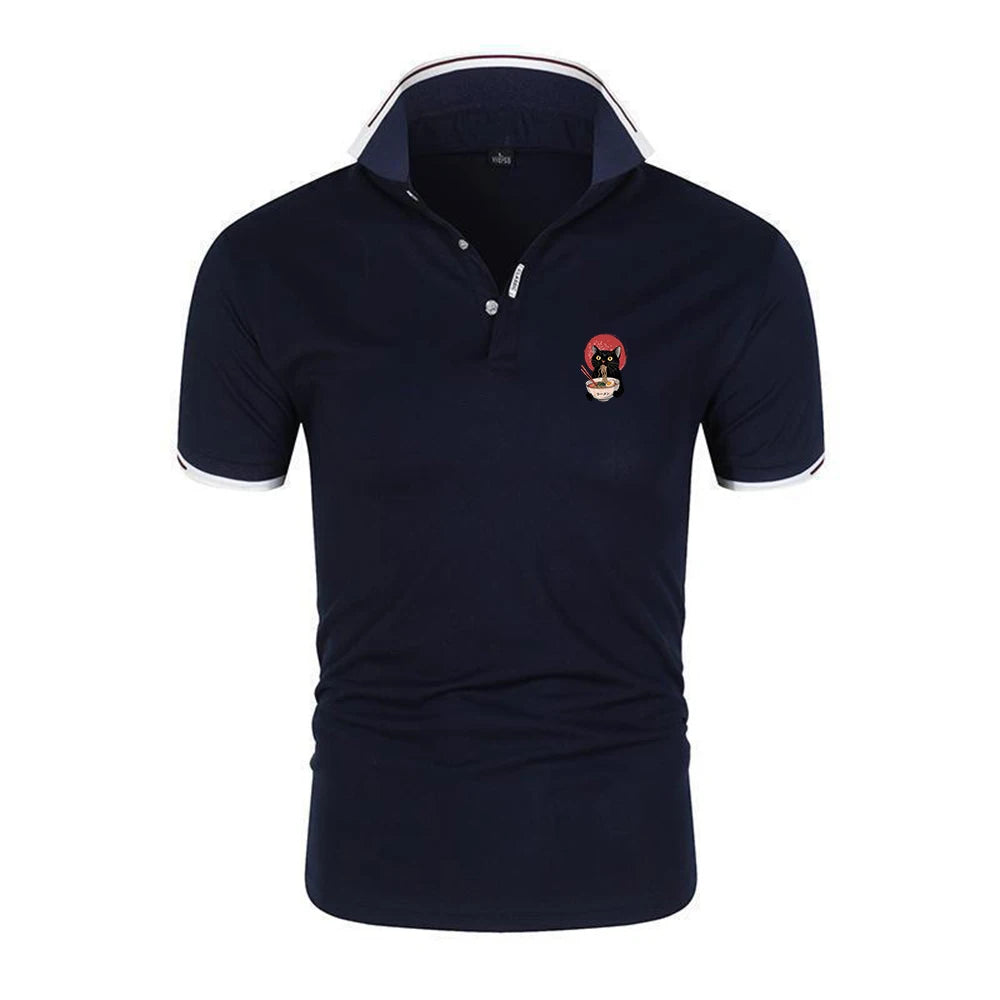 A navy blue short-sleeve polo shirt with white contrast stitching on the collar and sleeve cuffs, featuring a small embroidered cartoon character on the left chest.