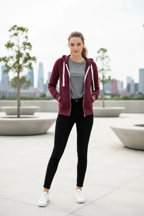 Maroon hoodie with white zipper and drawstrings on a white background
