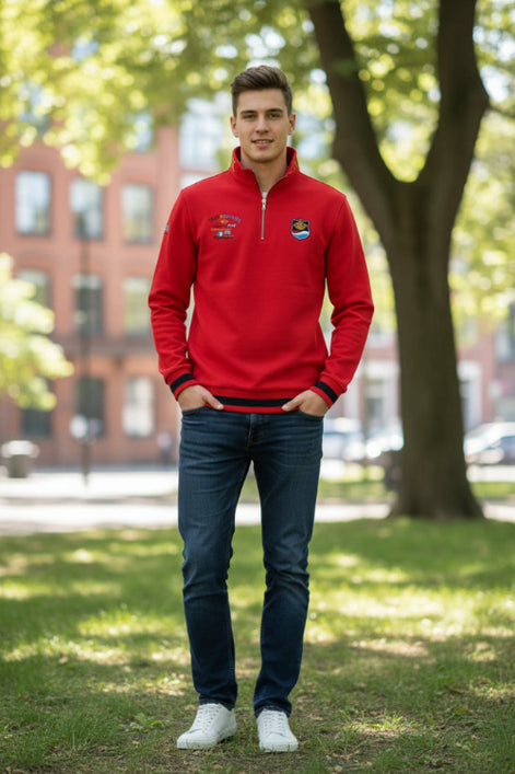 Red long-sleeve shirt with multiple logos on a white background, featuring the Tace & Shark brand.