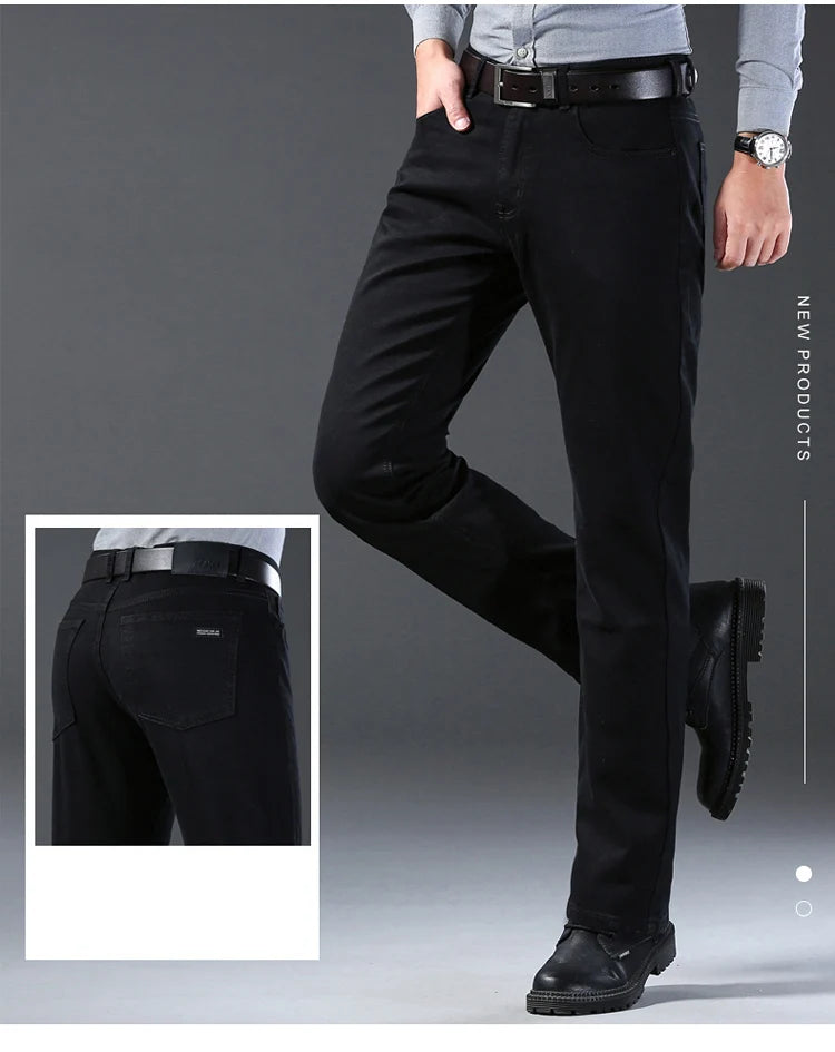 Person wearing black pants with a focus on the back view, on a gray background.