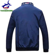 Blue jacket with a brand logo on the back against a white background