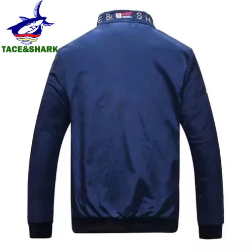 Blue jacket with a brand logo on the back against a white background