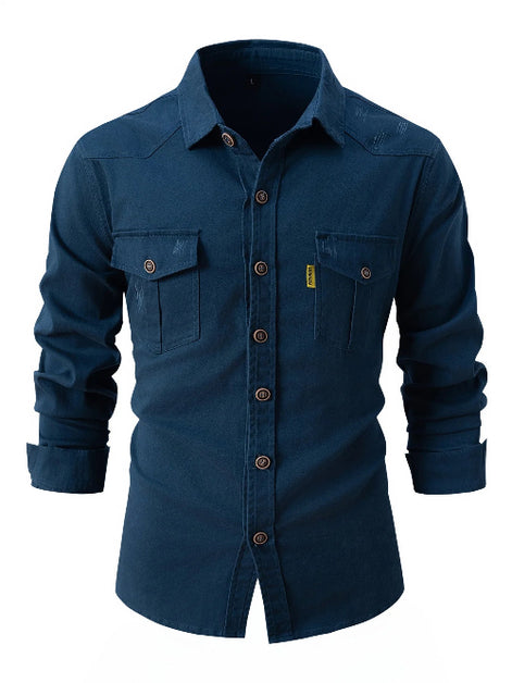 Blue button-up shirt with rolled-up sleeves on a white background