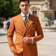 Orange suit with matching vest and pants on a white background