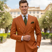 Orange suit with matching vest and pants on a white background