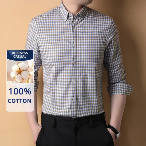Checkered shirt with 100% cotton label on a beige background