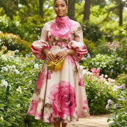 Woman wearing a floral dress with close-up insets of fabric texture and design.