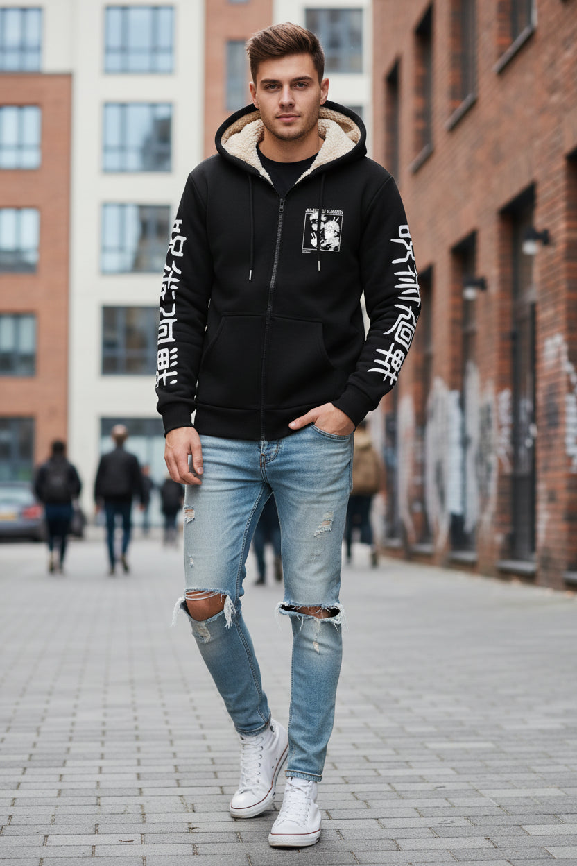 Black hoodie with 'JuJutsu Kaisen' design on a textured beige background